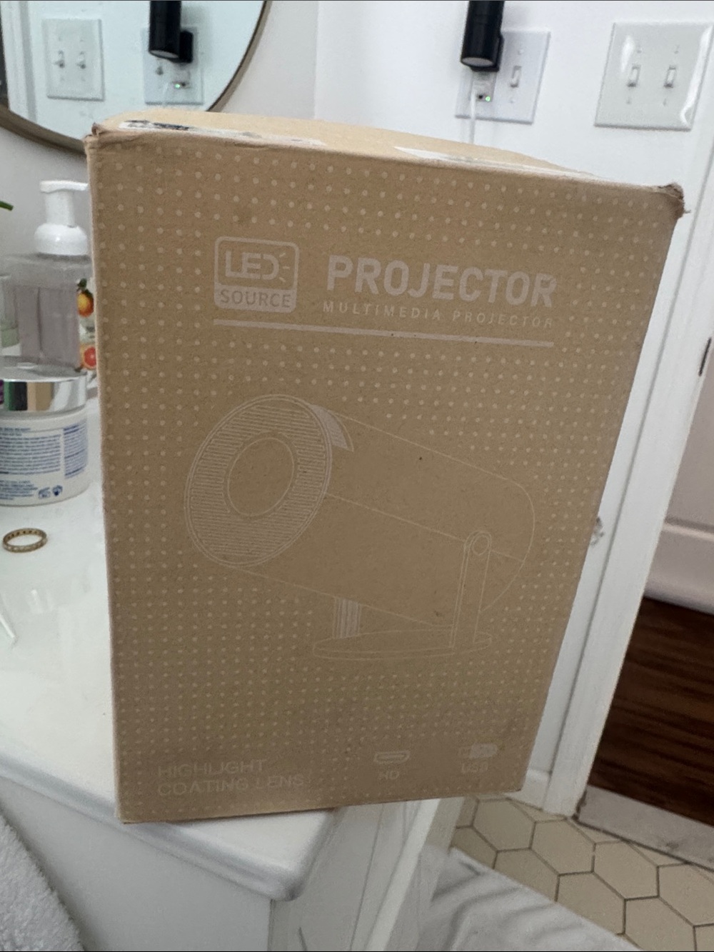 Amazon Portable Projector in Brown Cardboard Packaging